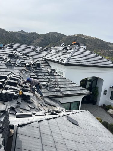 Concrete tile roof replacement in progress